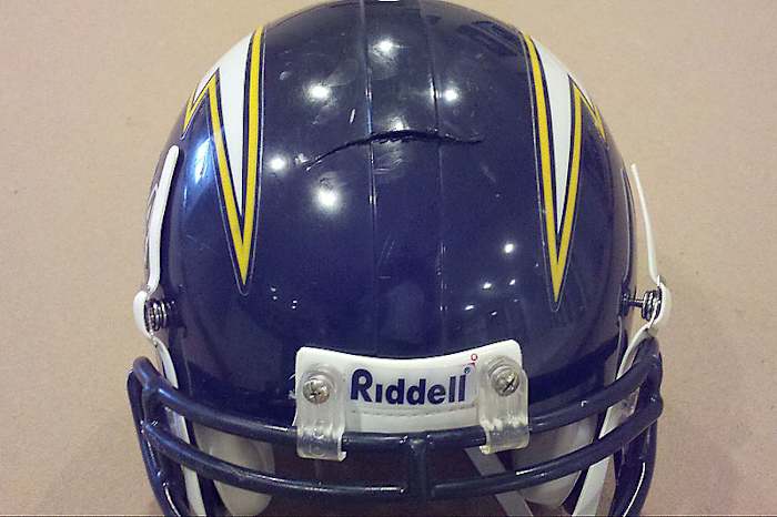 The cracked helmet from Fred McCrary keeps from his training-camp collision with teammate Junior Seau. (Jim Trotter/SI)